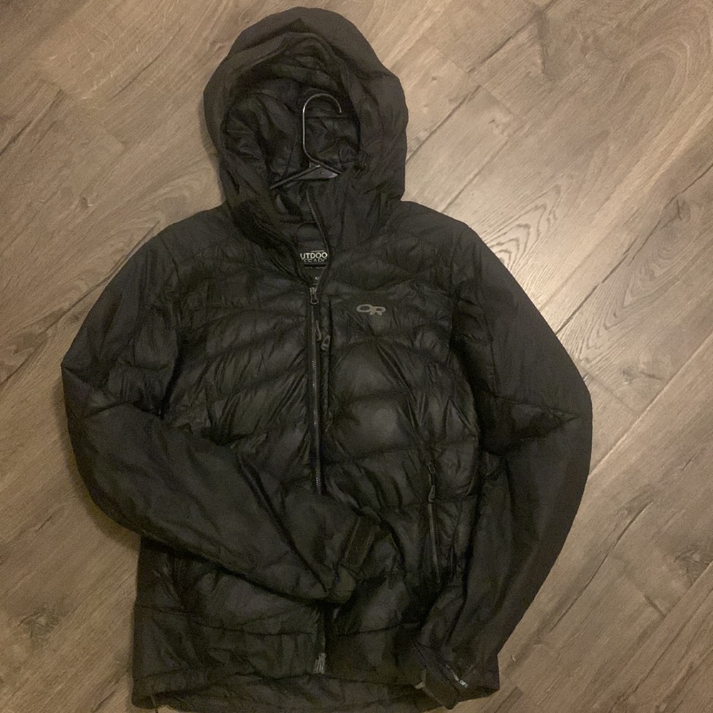 Women’s black hooded Outdoor Research puffy - size M